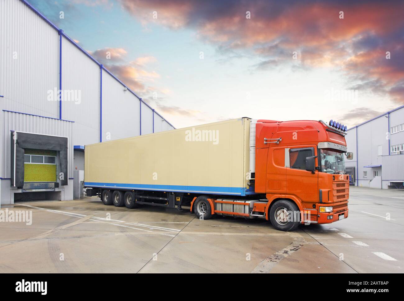 Truck in unloading in warehouse Stock Photo