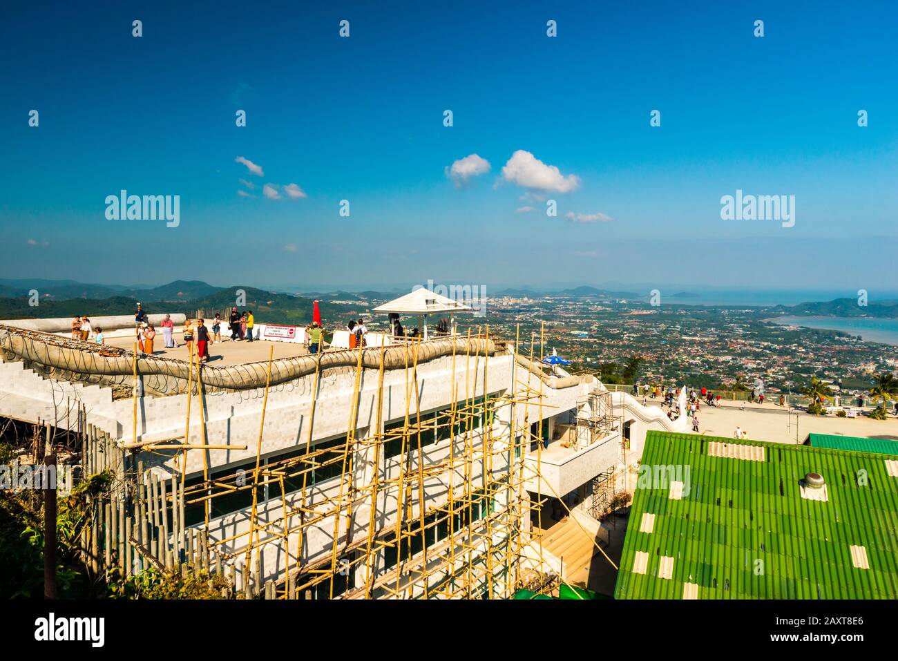 Nakkerd Hill, Phuket/Thailand-15December2019: Big Buddha hilltop viewpoint, with construction on site visible and the cityscape and sea in background Stock Photo