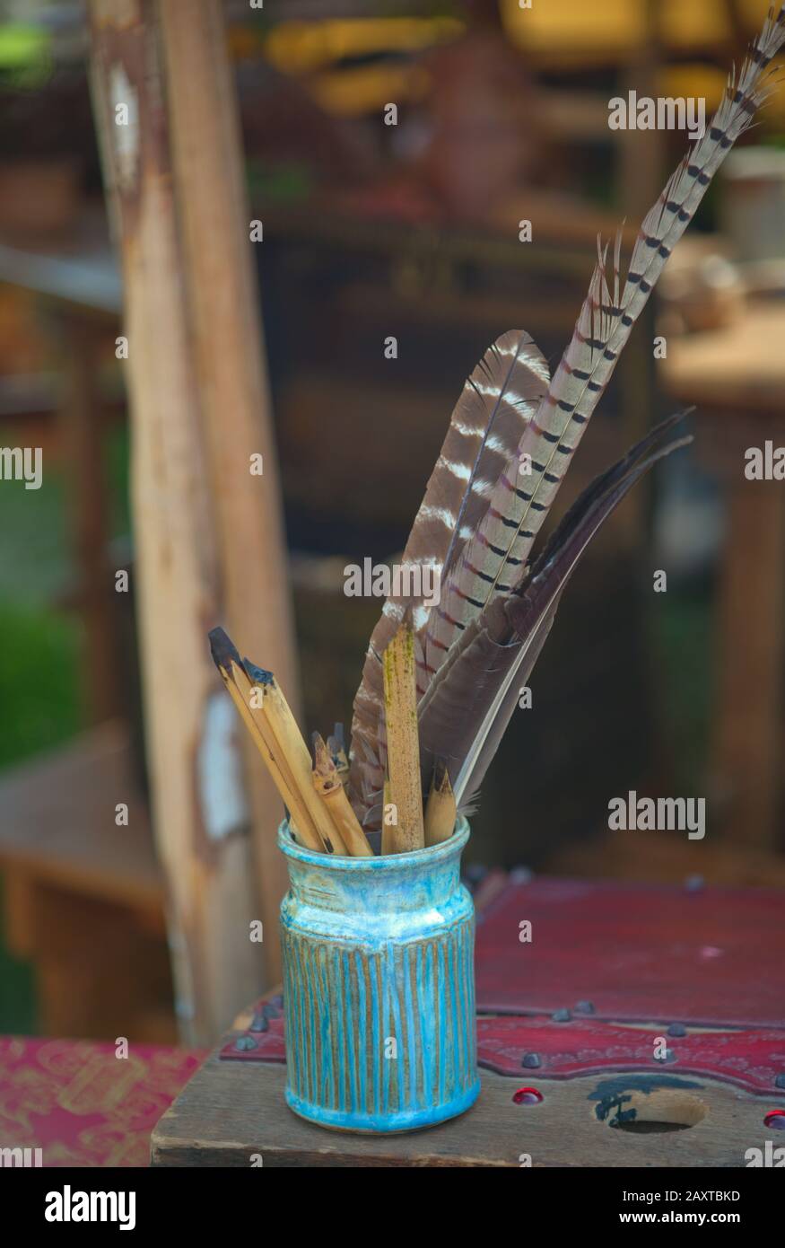 Small vase full with tools for medieval clerk Stock Photo