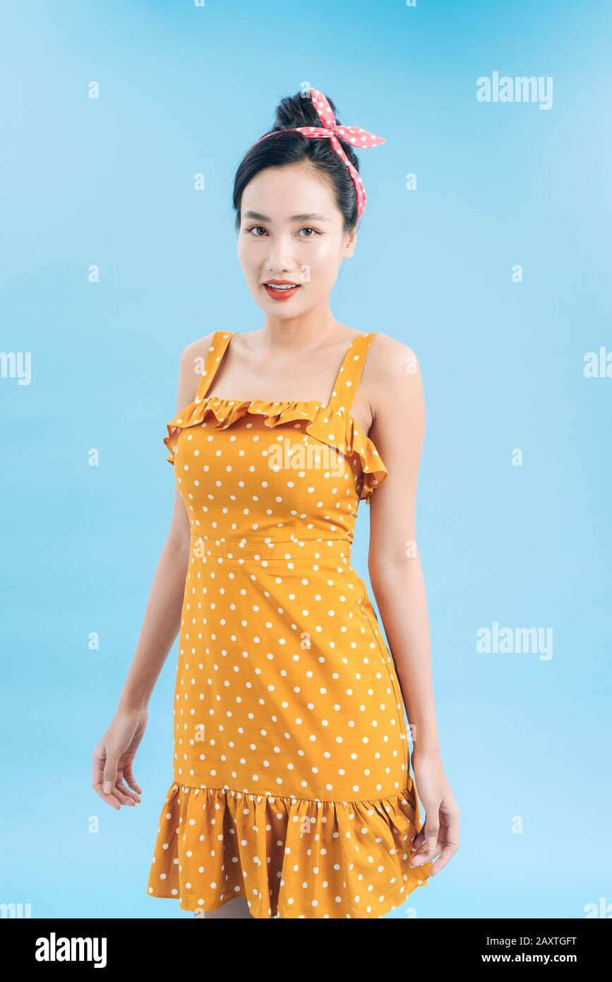 Asian model posing in retro fashion and vintage concept shoot. Copyspace area for advertising slogan or text message. Stock Photo