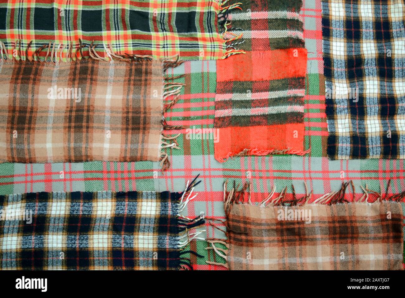 background multicolored old wool blanket stitched cell Stock Photo
