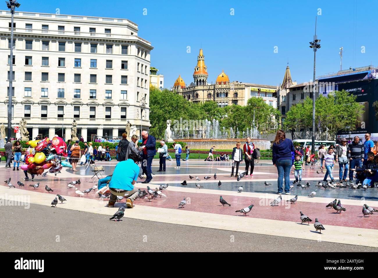BARCELONA, SPAIN - APRIL 7, 2017: The ambiance in Placa Catalunya in Barcelona, Spain, the square which is considered to be the city center, where som Stock Photo