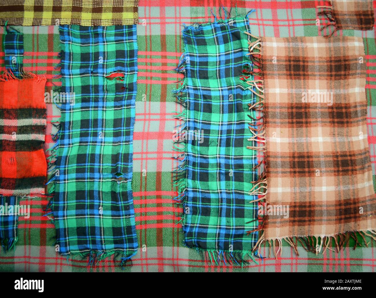background multicolored old wool blanket stitched cell Stock Photo