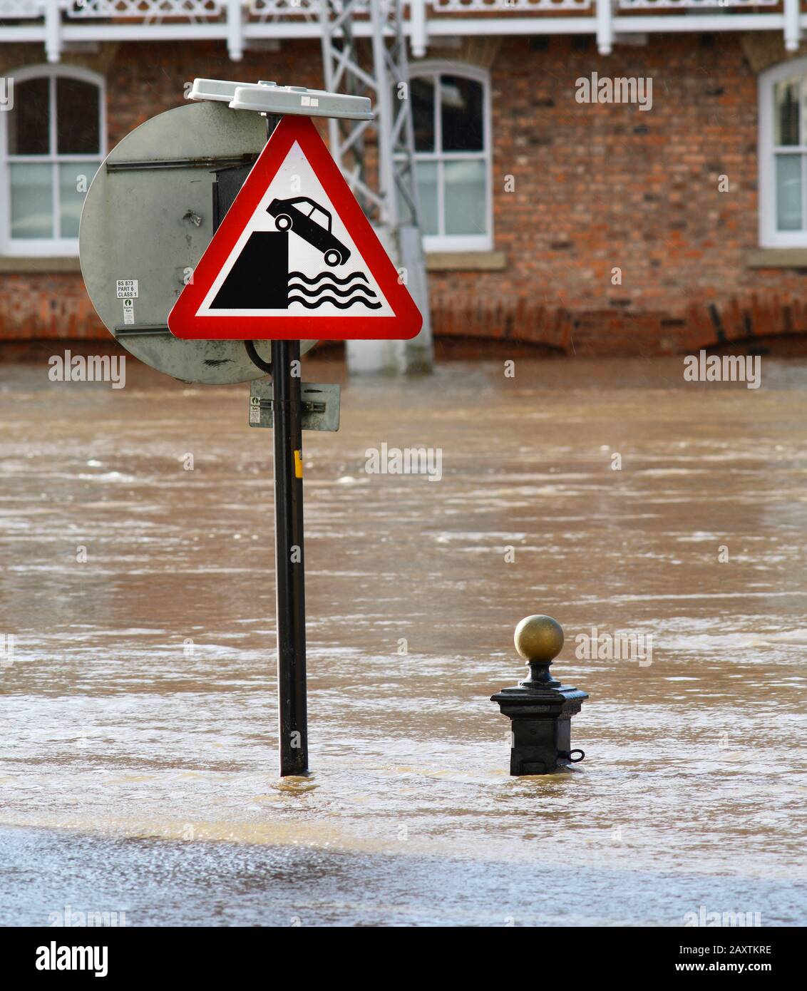 flooding after the river ouse burst its banks by warning roadsign of quayside ahead york yorkshire united kingdom Stock Photo
