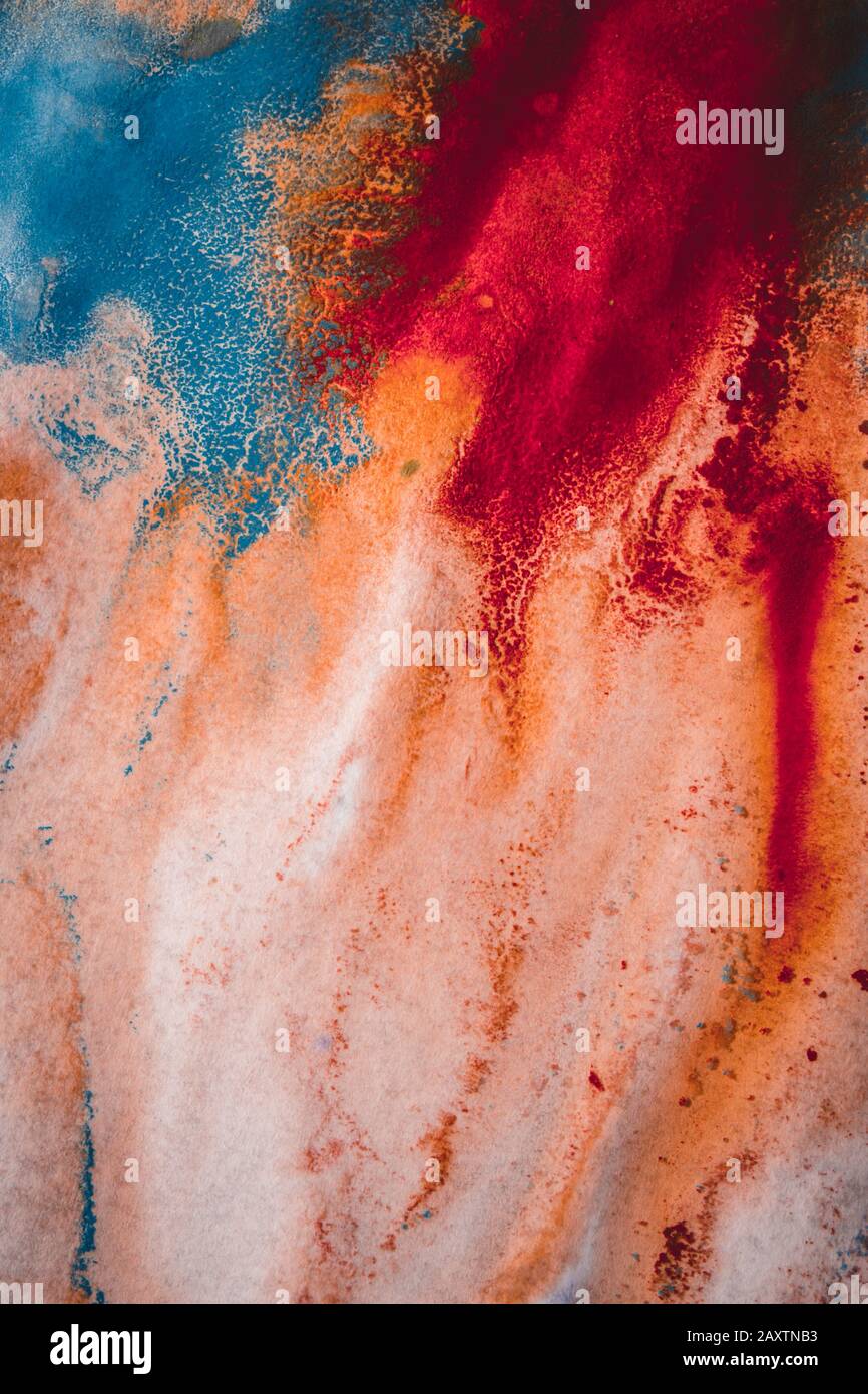 abstract streaks of red and blue paint on white paper Stock Photo