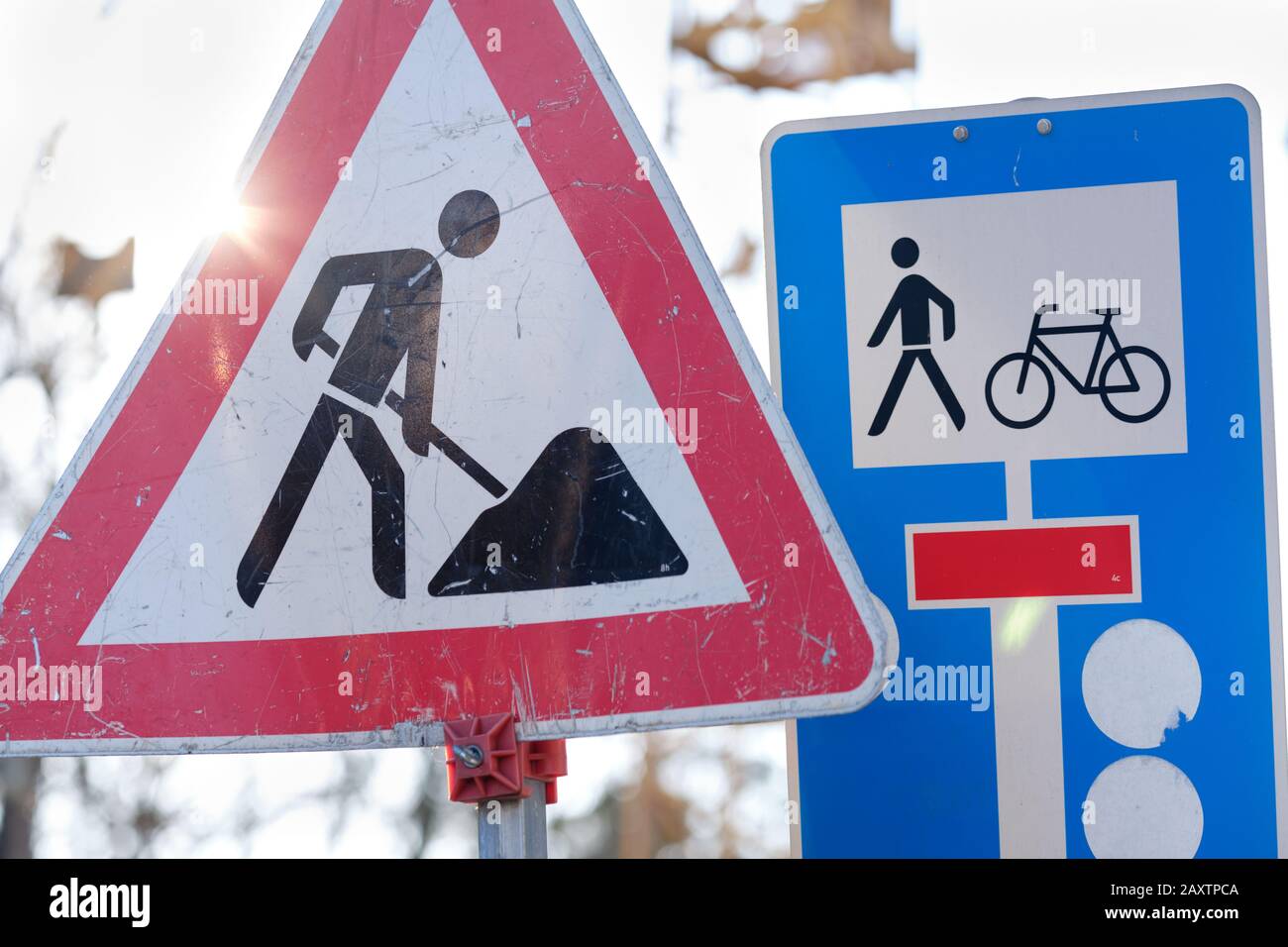 Traffic Signs For Attention Construction Site And For Dead End Street With Footpath And Cycle Path Against The Bright White Sky Seen In Germany In Fe Stock Photo Alamy