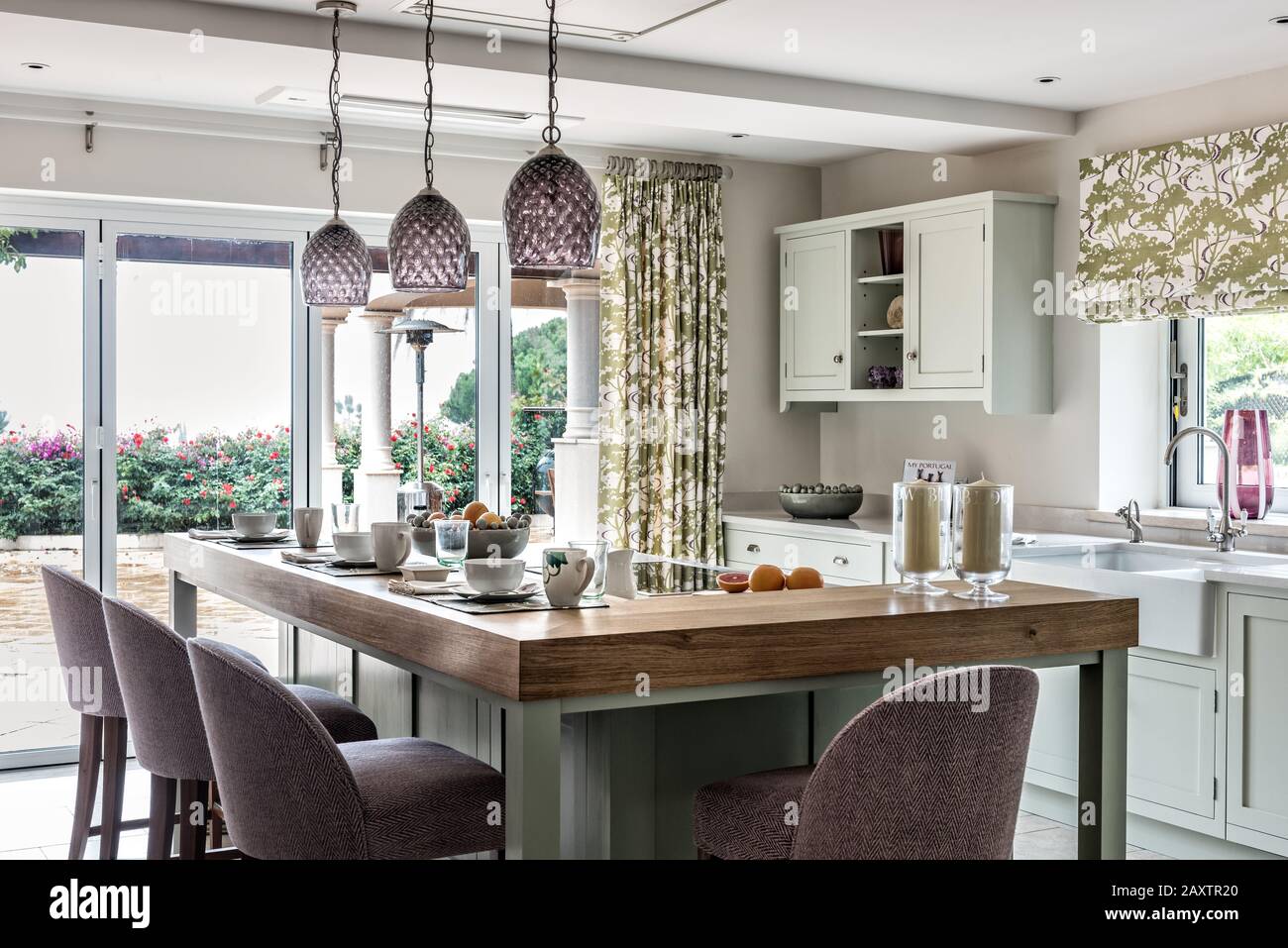 Place settings on kitchen counter Stock Photo Alamy