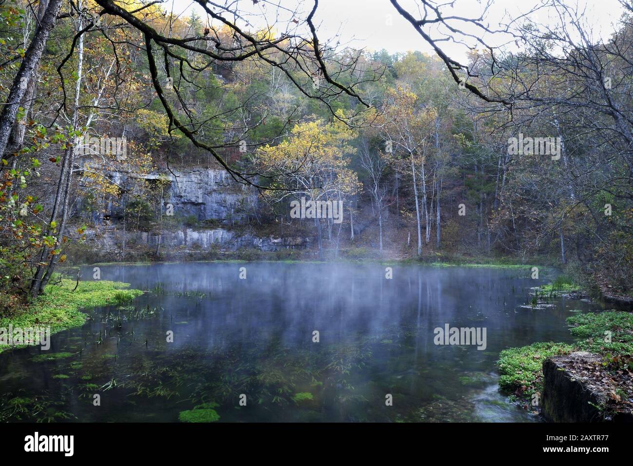 Beautiful view of the Alley Spring surrounded by rocky mountains and
