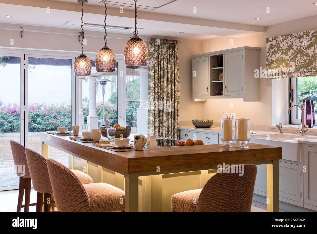 Place settings on kitchen counter Stock Photo Alamy