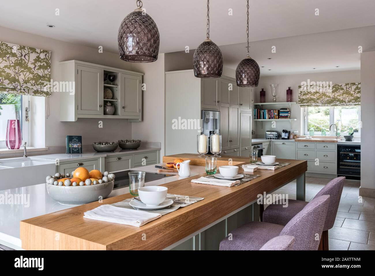 Place settings on kitchen counter Stock Photo Alamy