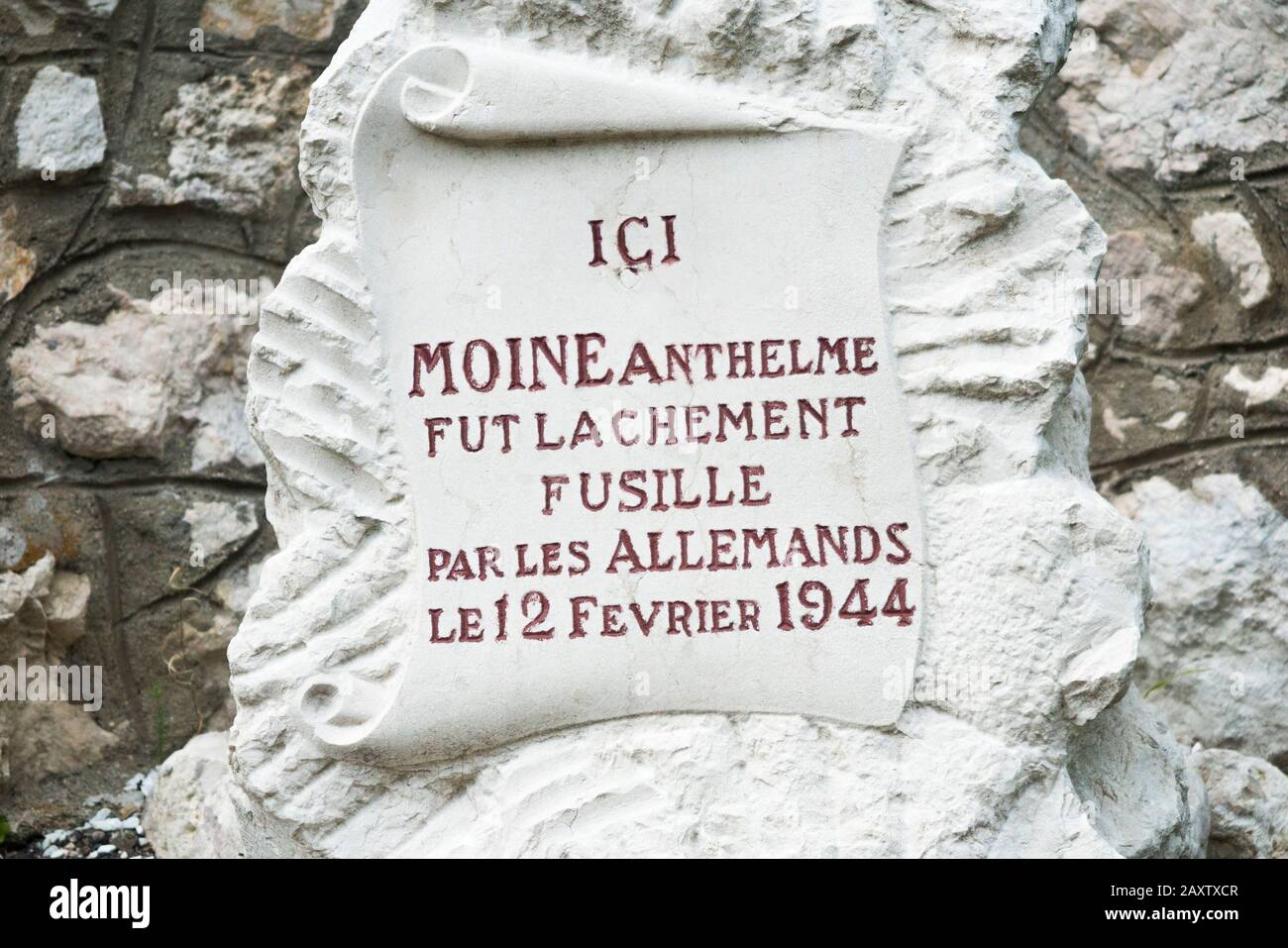 Monument where Monk Anthelme was shot / executed in a cowardly fashion by German Nazis forces in February 1944, during World War Two / 2 / II / WW2 in Ain, France, which was under the authority of Vichy France (112) Stock Photo
