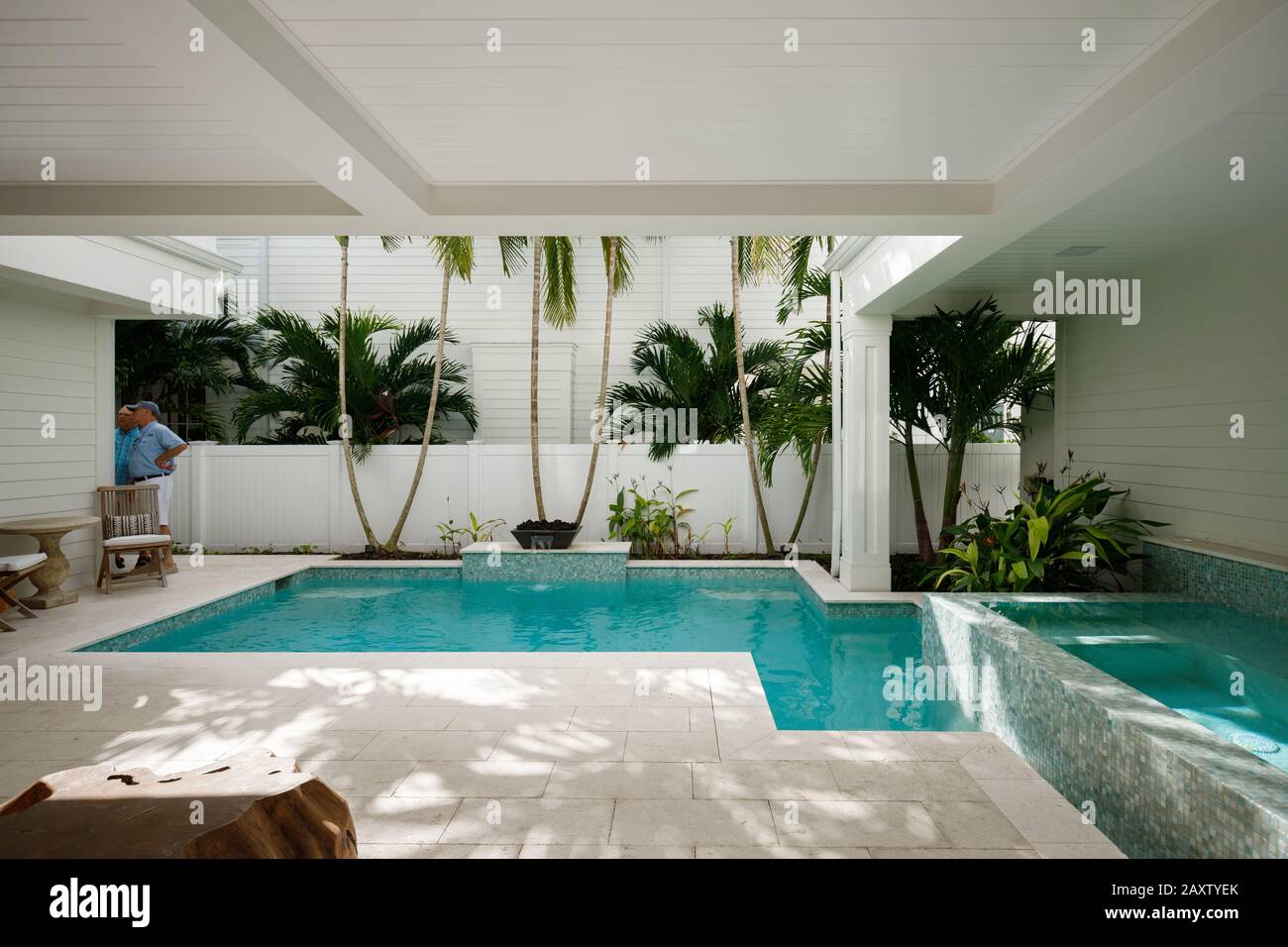 Luxury beachfront villa in Naples, Florida. Luxury patio with palms and