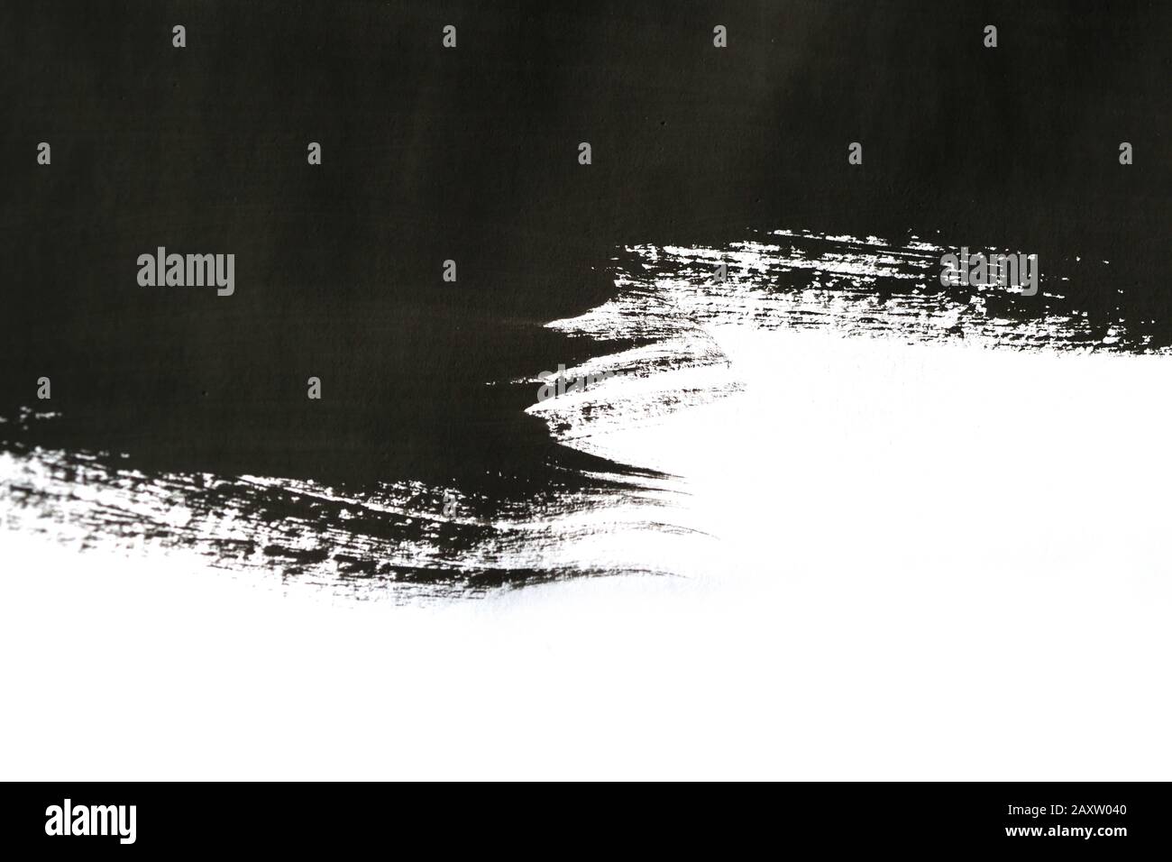 black abstract improvised brush strokes on white paper with one hand ...