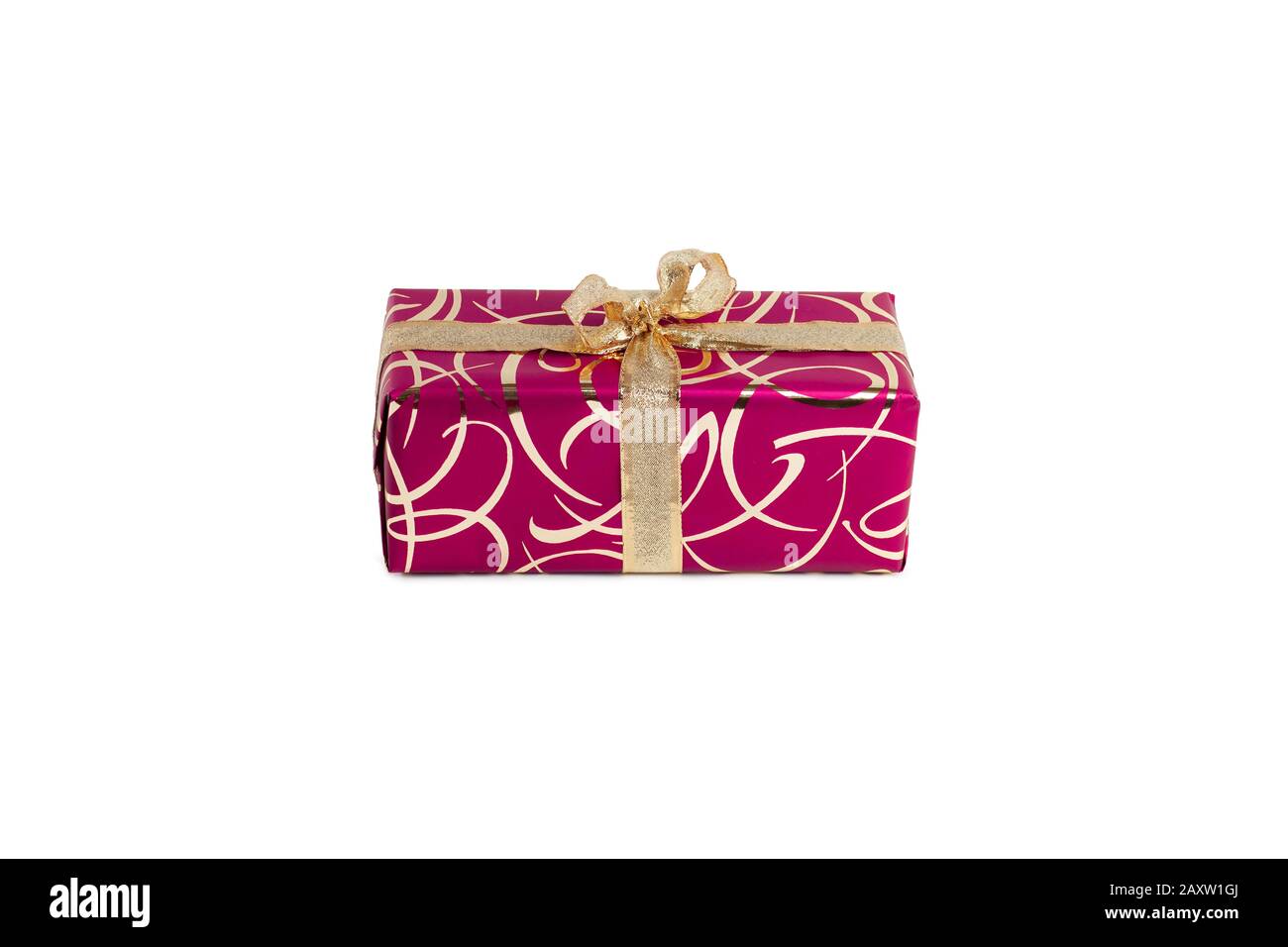 packaged rectangular gift in dark pink packaging with gold bow and gold pattern on a white background Stock Photo