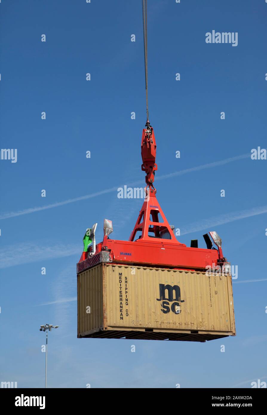 Crane lifting container Stock Photo