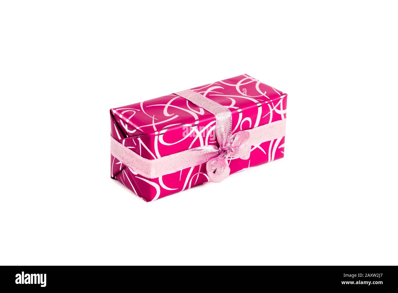packaged rectangular gift in pink packaging with gold bow and gold pattern on a white background Stock Photo