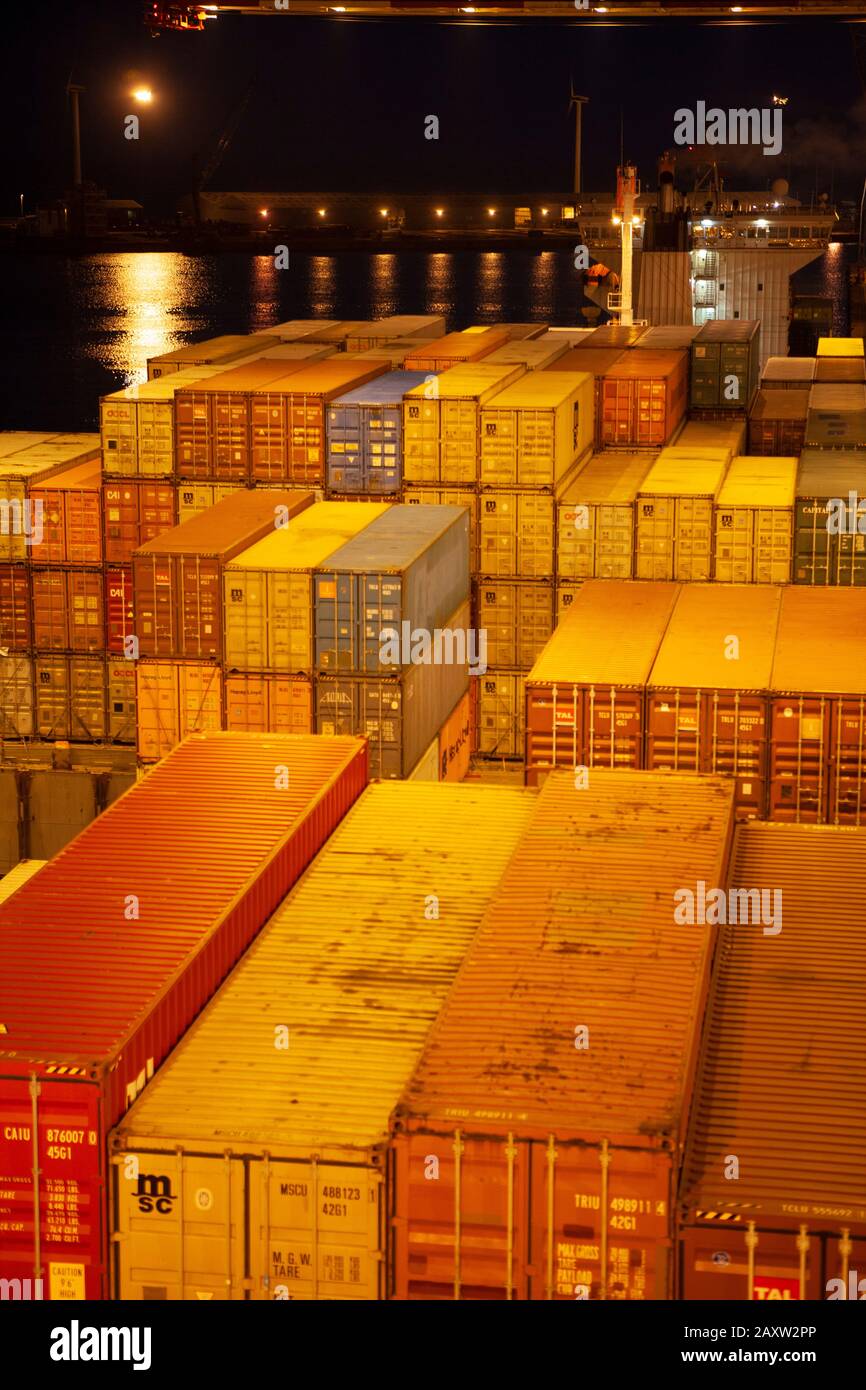 Chinese raw steel rolls at the dockside warehouse imports Stock Photo