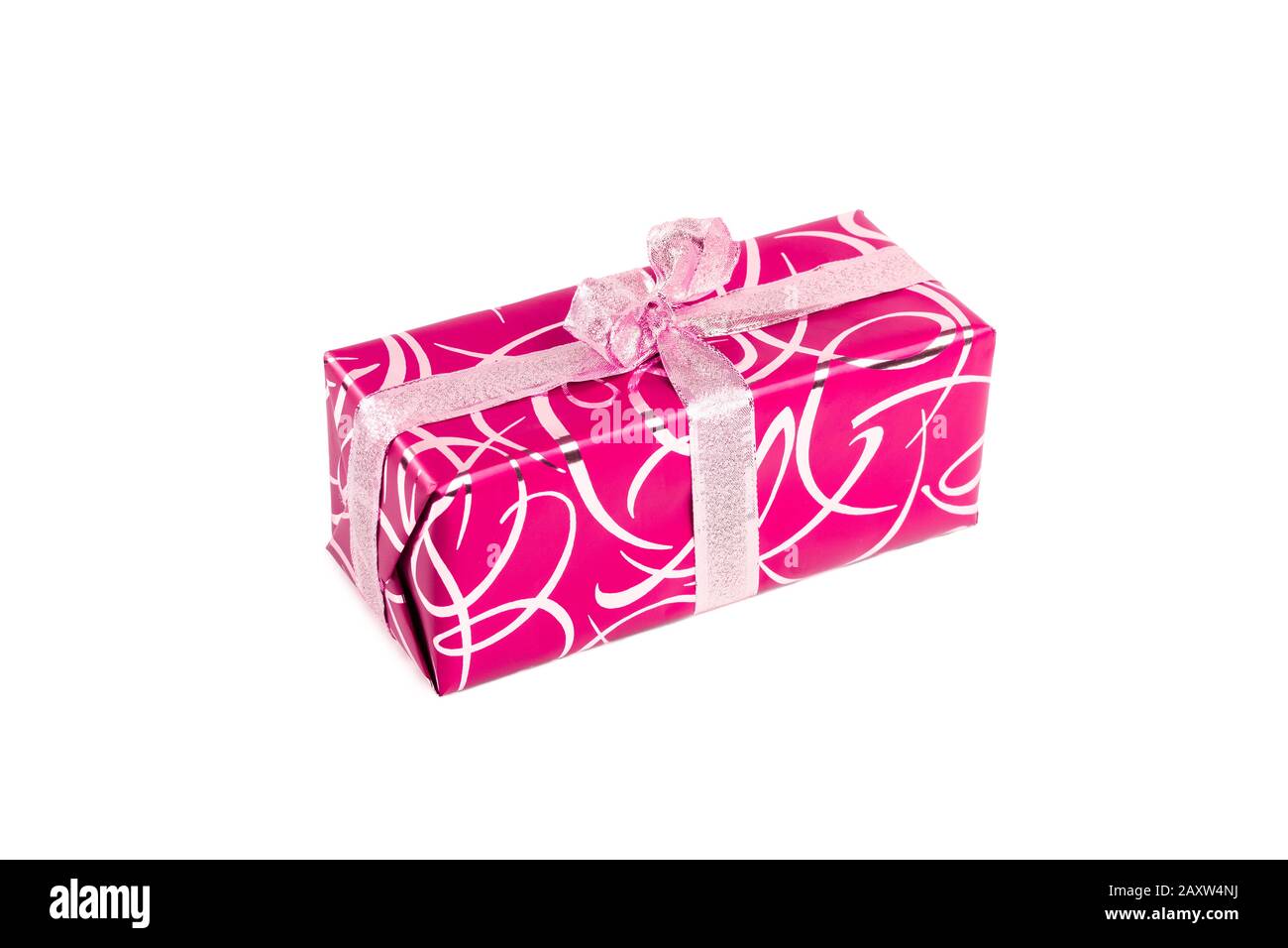 packaged rectangular gift in pink packaging with gold bow and gold pattern on a white background Stock Photo