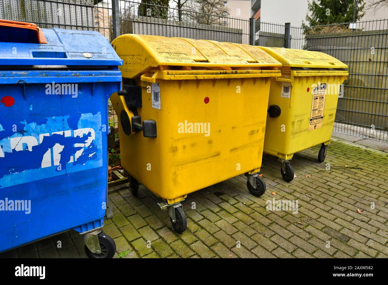 Heidelberg, Germany February 2020 Yellow container bins for recyclable reusable materials in