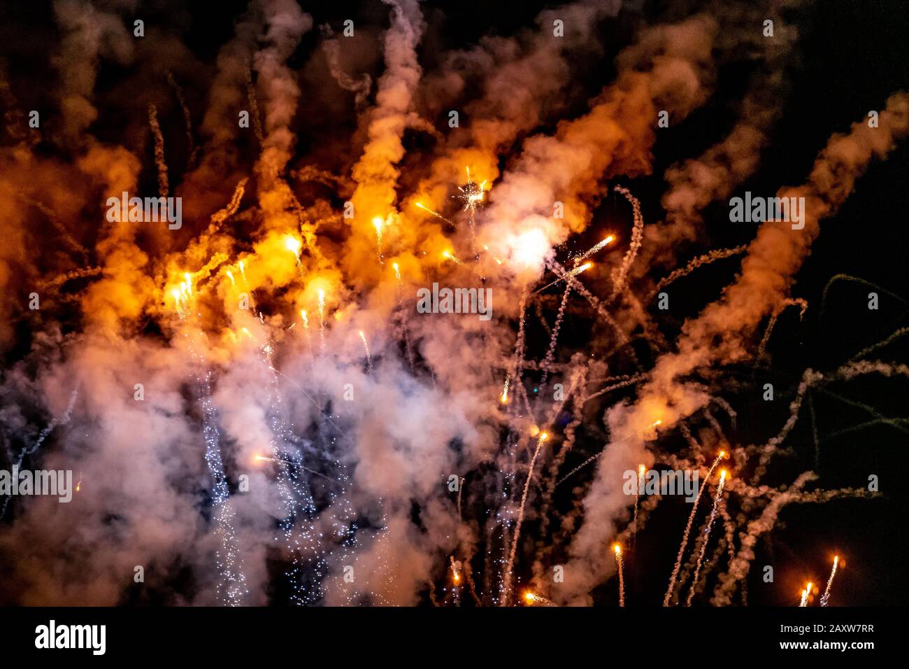 Festive fireworks in the night sky Stock Photo
