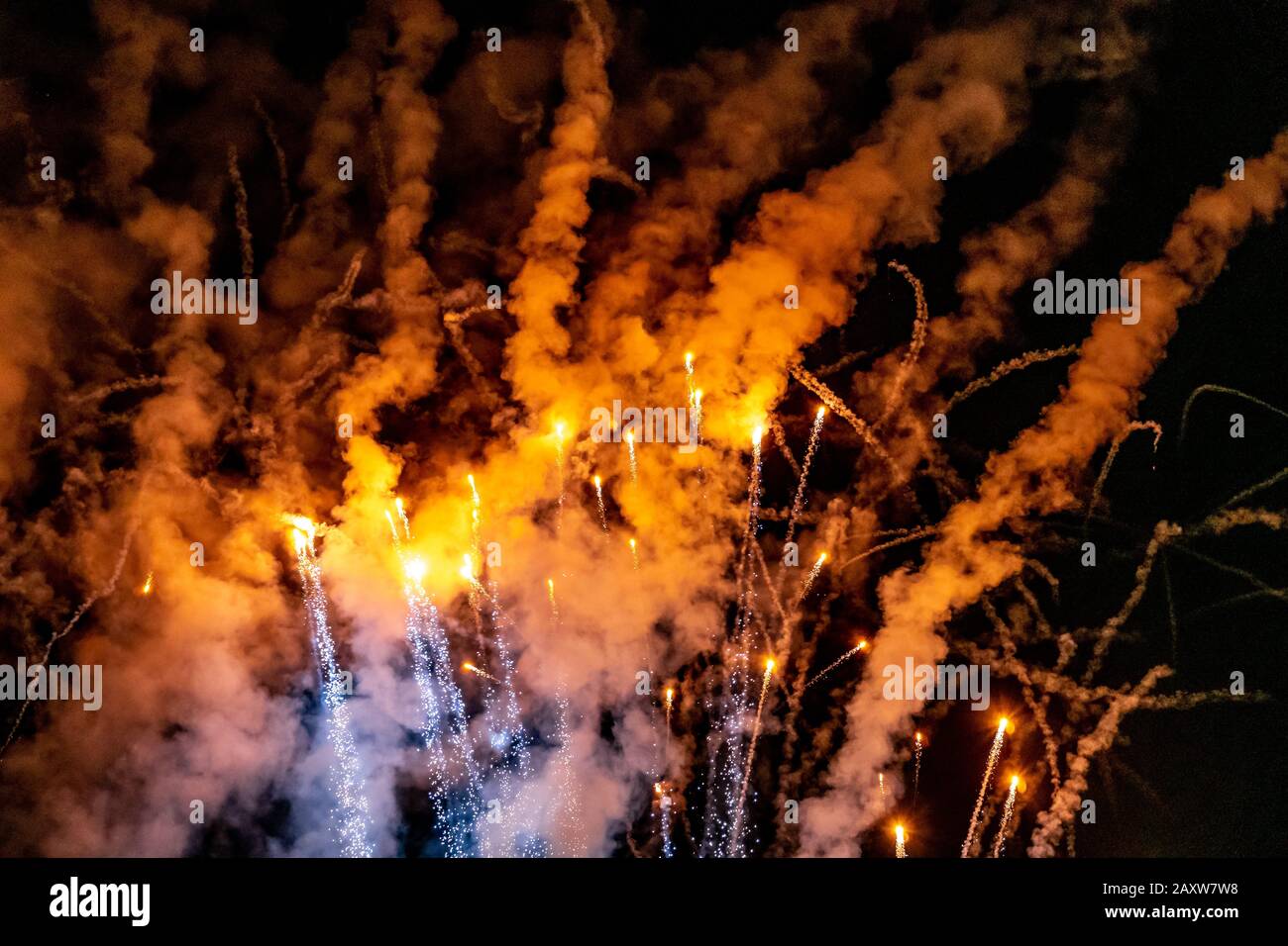 Festive fireworks in the night sky Stock Photo