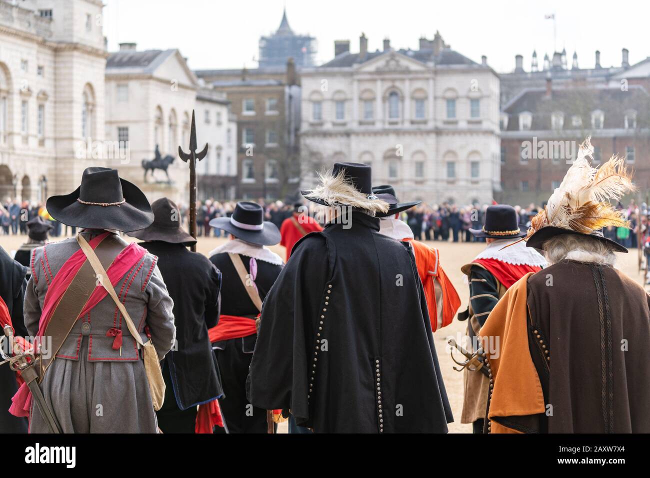 Members of the English Civil War Society in historical costume, lead the parade to commemorate the execution of King Charles I Stock Photo