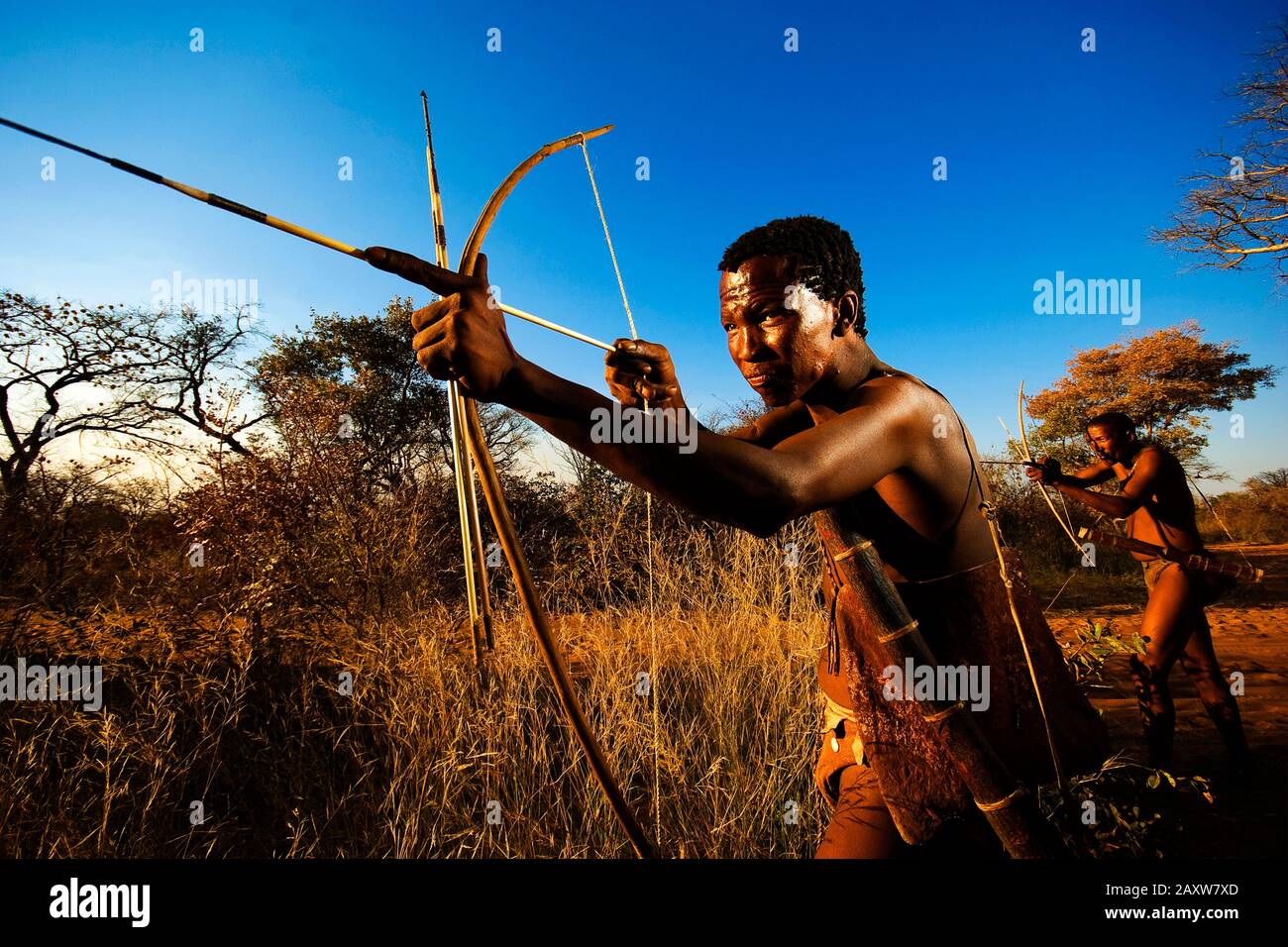 Bushmen simulating a hunt at Grashoek bushland, Namibia Stock Photo - Alamy