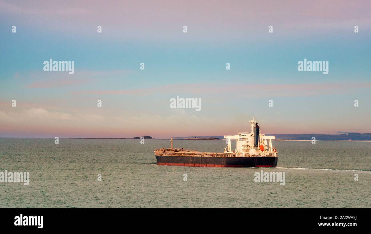 A tanker-cargo ship sailing at sea in Australia Stock Photo