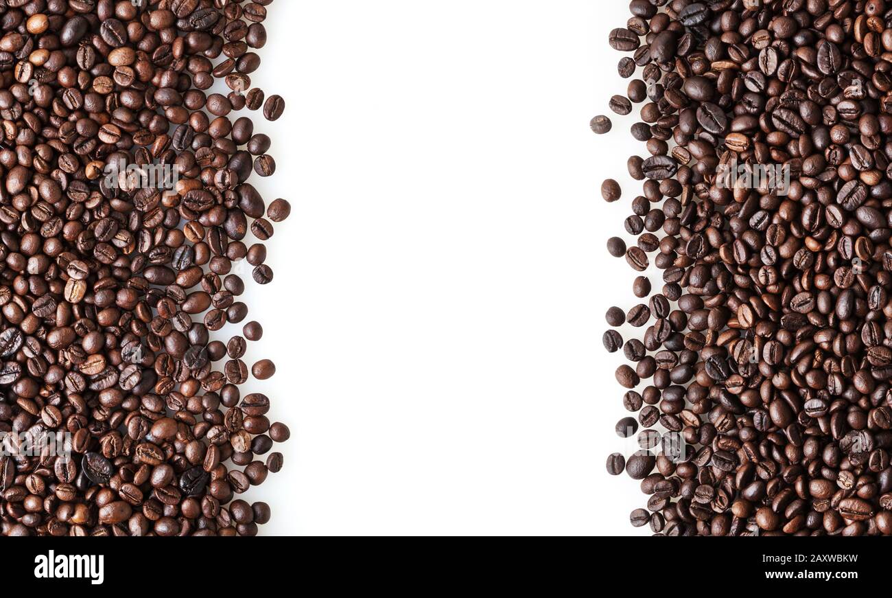 Roasted coffee beans on white background with copy space Stock Photo ...