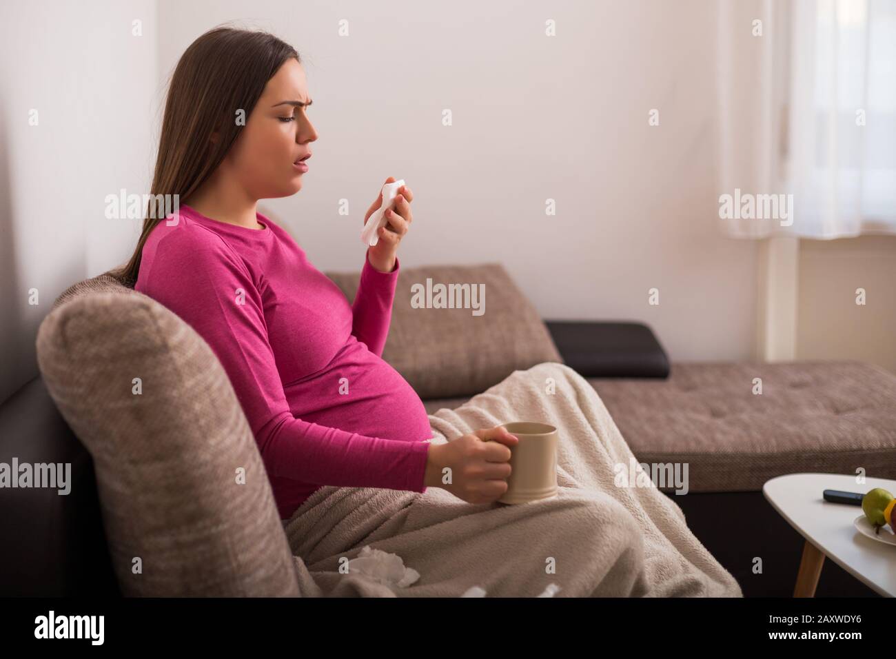 Pregnant woman coughing hires stock photography and images Alamy