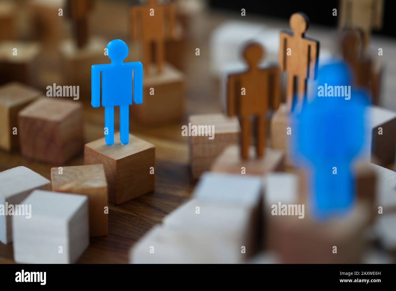Lonely blue toy man figurine met soul mate closeup Stock Photo
