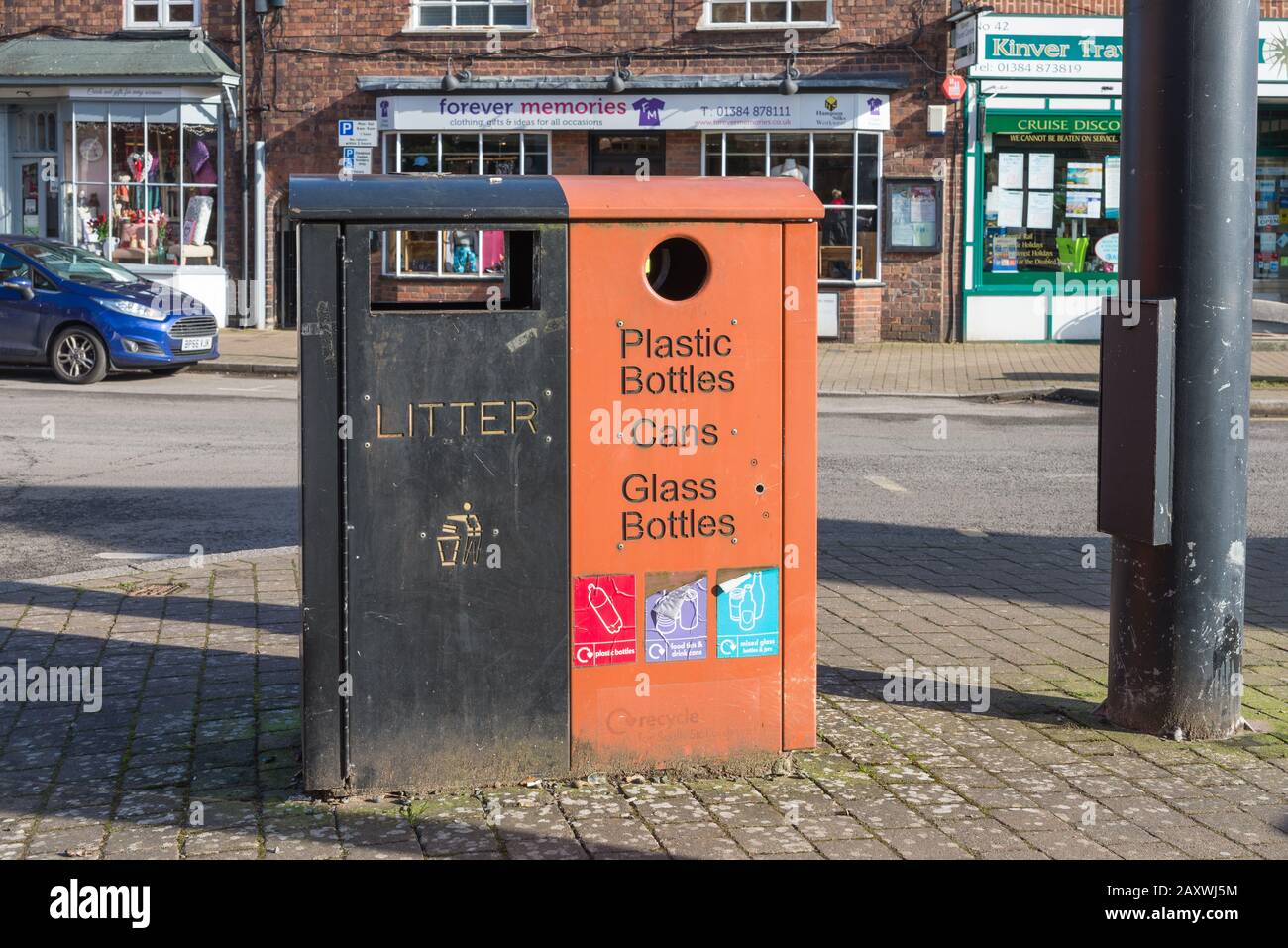 Adjacent litter and recycling bins in the pavement in Kinver, South Staffordshire Stock Photo