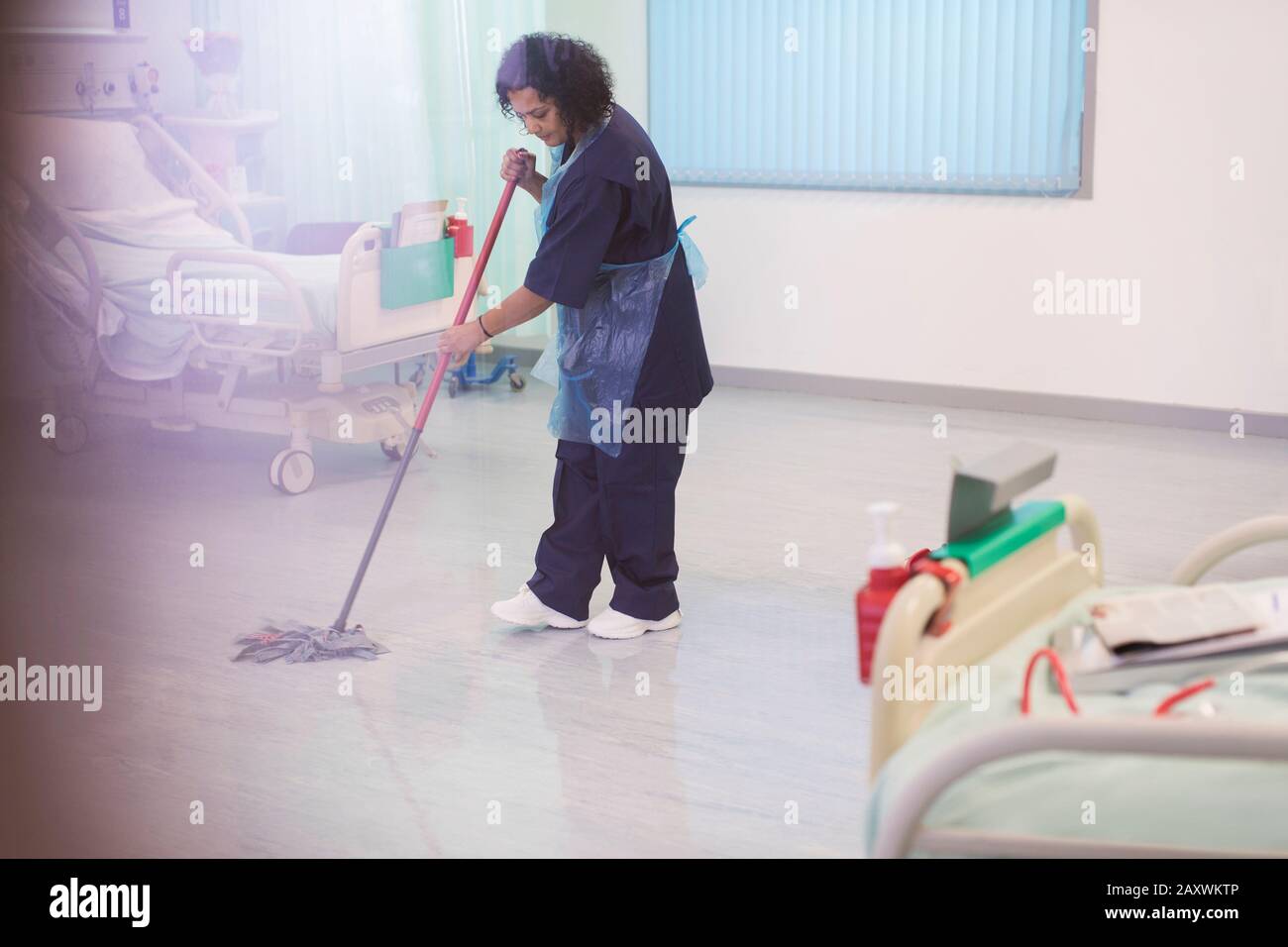 Female orderly mopping hospital ward floor Stock Photo Alamy