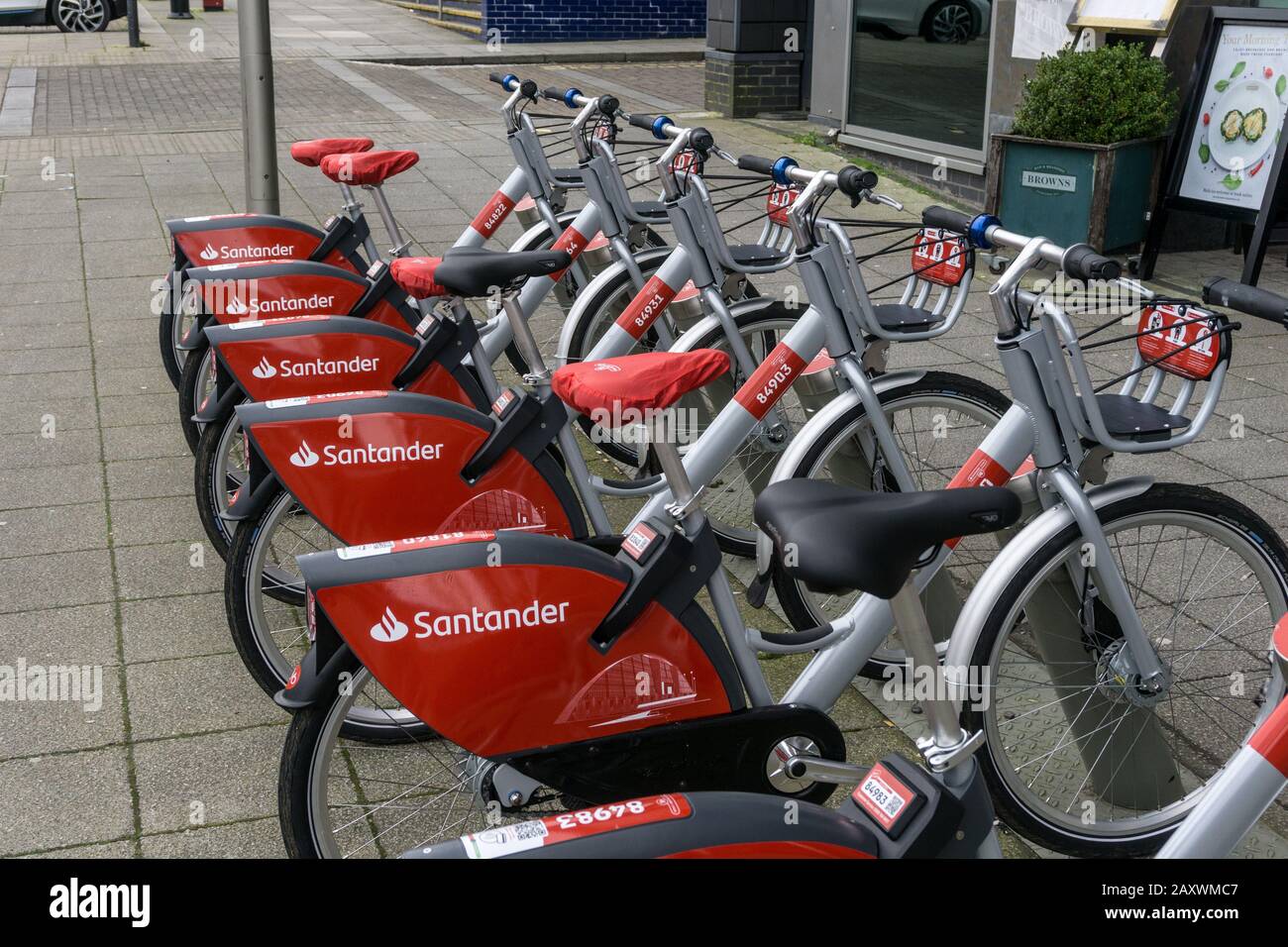 Santander bicycles for hire in Central Milton Keynes, UK; the company has a long association with the town with its Head Office based there. Stock Photo