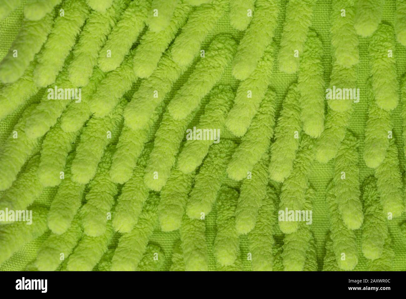 Green microfiber cleaning glove sponges for cleaning and a environmental skin friendly close up Stock Photo