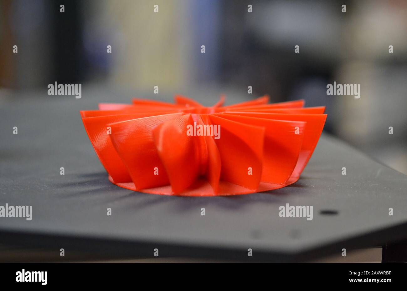 Red model printed 3D printer close close-up. Progressive modern ...