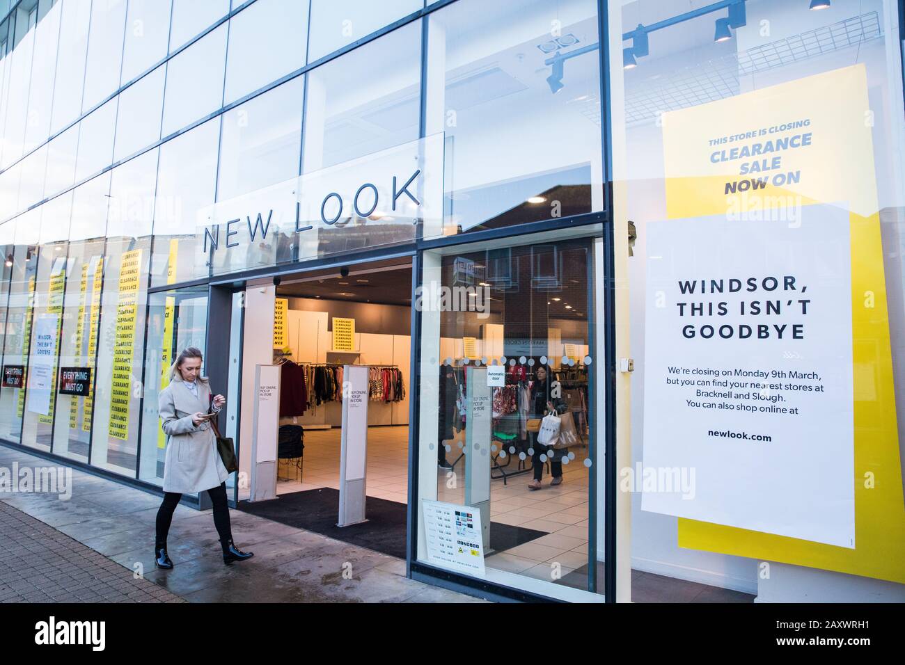 Windsor, UK. 13 February, 2020. A New Look store in Windsor Yards, a  shopping area in the heart of the historic town, displays closing down  notices. A nearby Topshop store is also