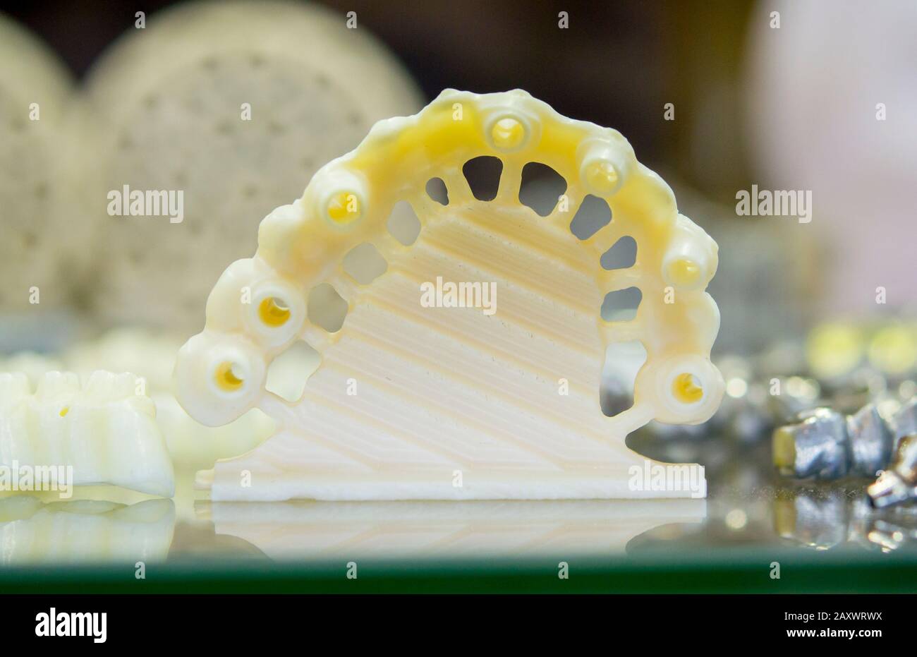carved crowns for teeth with a milling machine cad cam close-up Stock ...