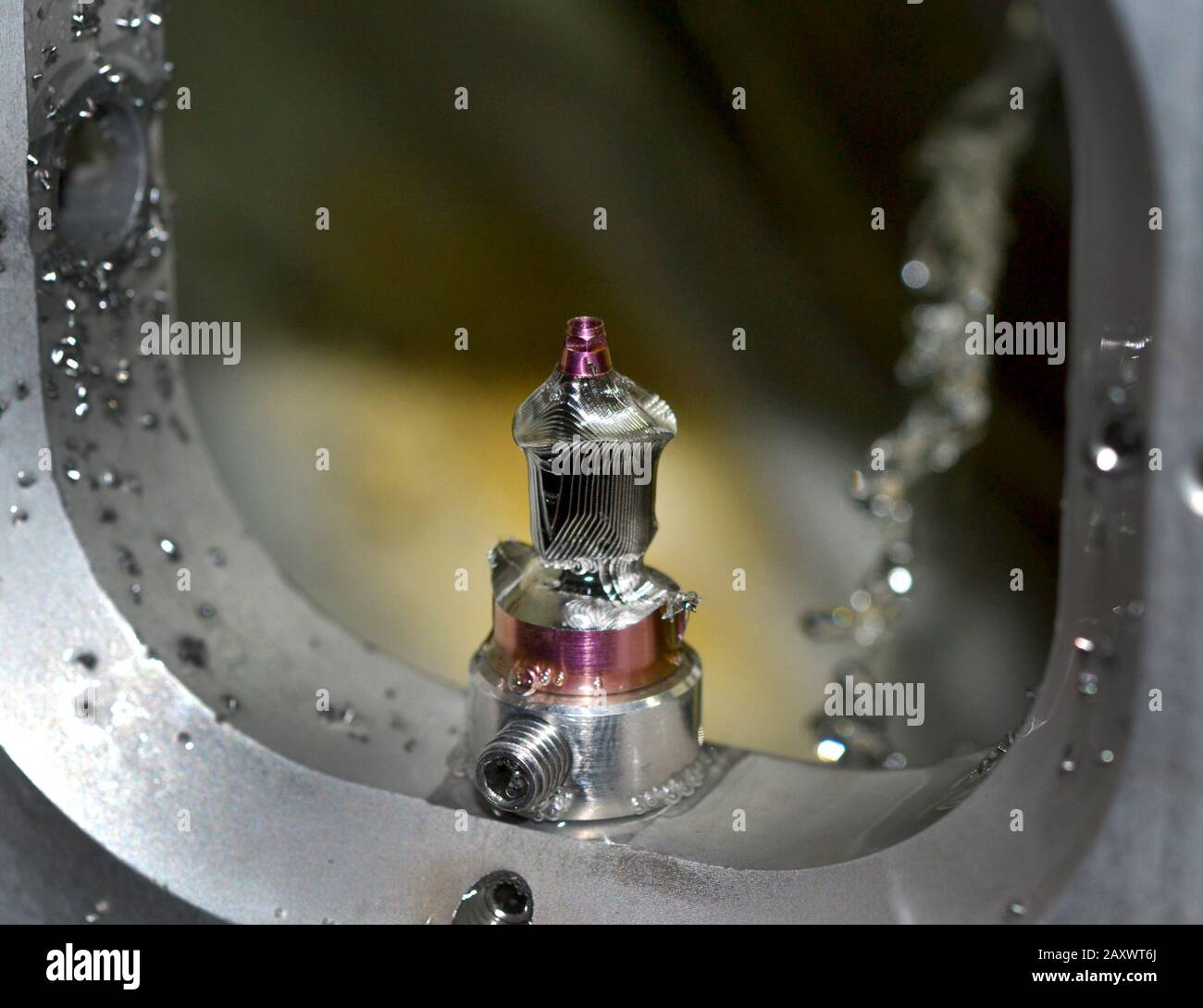 Milling abutment close-up. Cutting and milling of titanium abutment crown base for dental implant. Modern technology cad cam Stock Photo