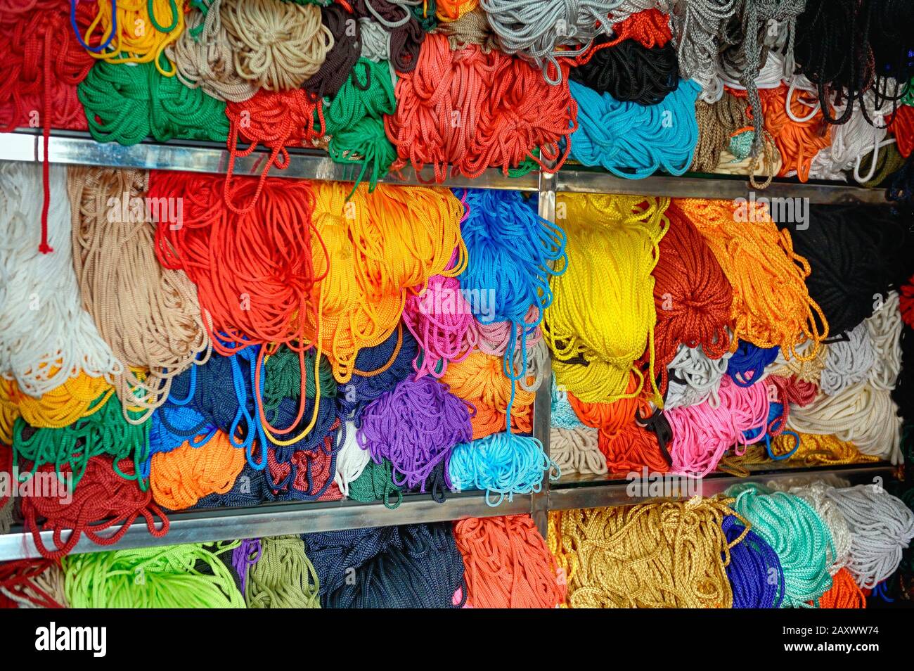 Stock of lanyards & twines balls of different sizes and colors. Stock Photo