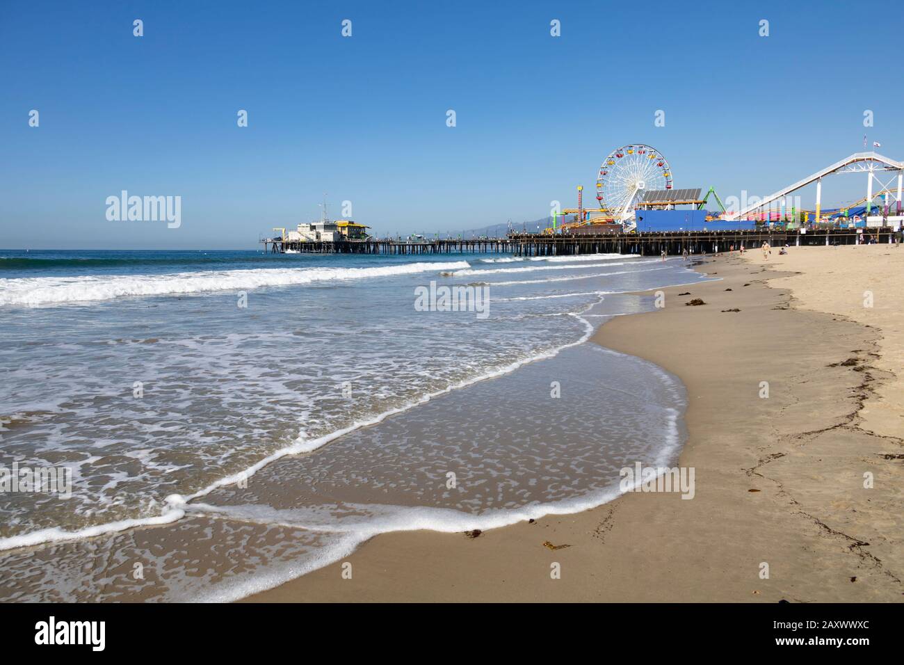 Santa Monica beach and pier with Pacific Park amusements, , California ...