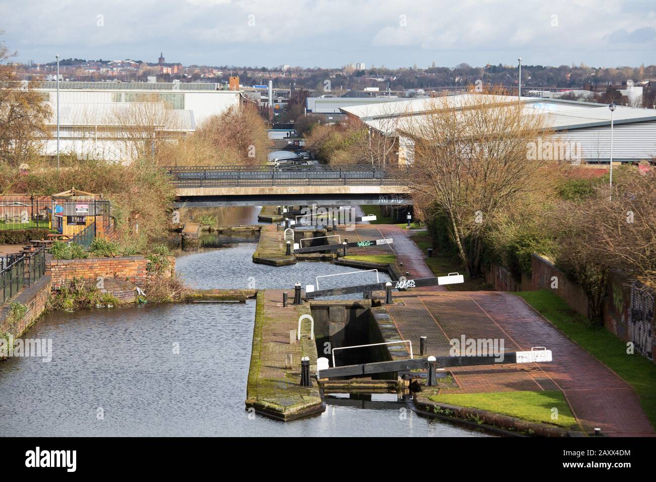 The Aston locks along the Birmingham Fazeley canal looking towards Spaghetti Junction pictured from Dartmouth Middleway. Stock Photo