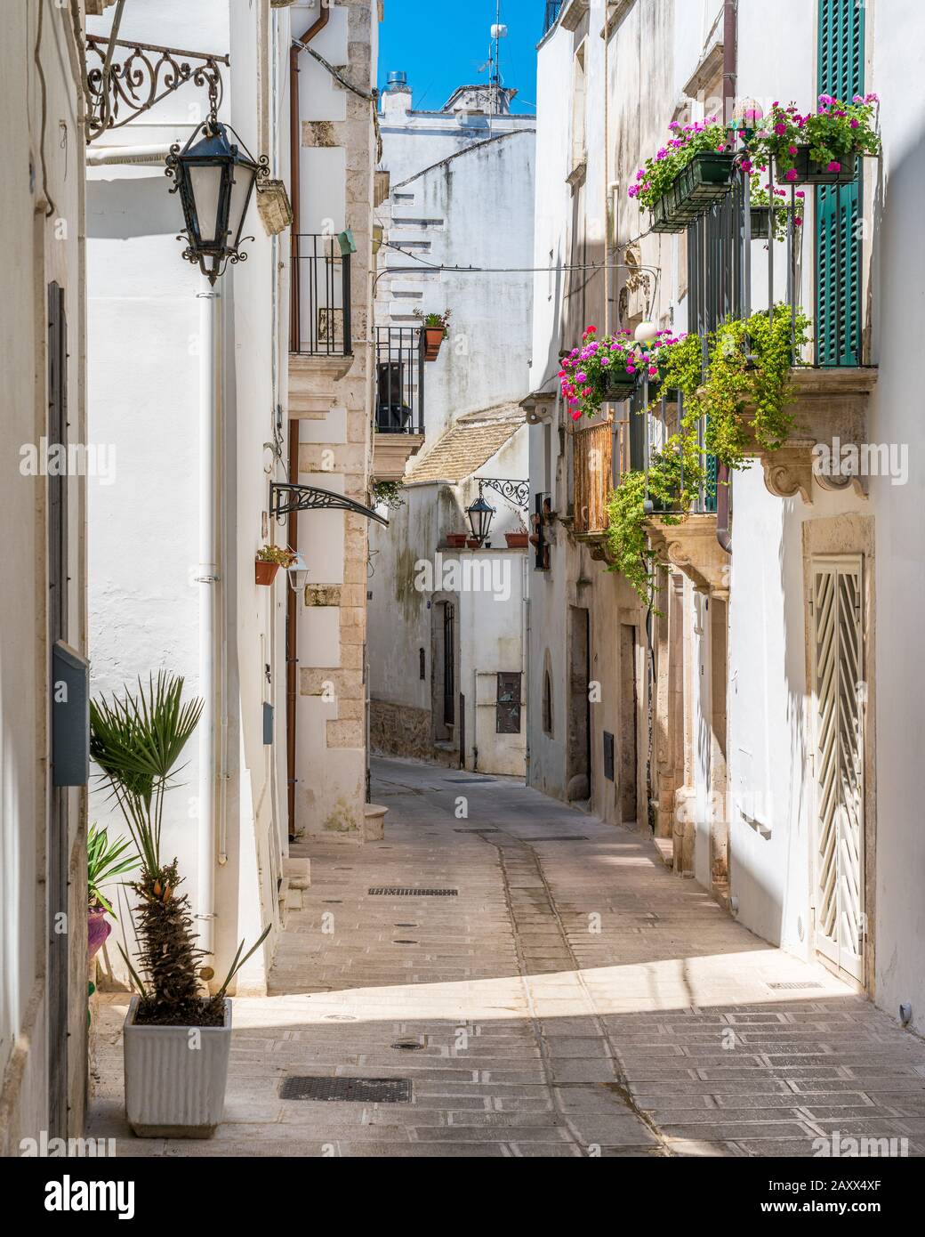 Scenic sight in Martina Franca on a sunny summer morning, province of Taranto, Apulia, southern Italy. Stock Photo