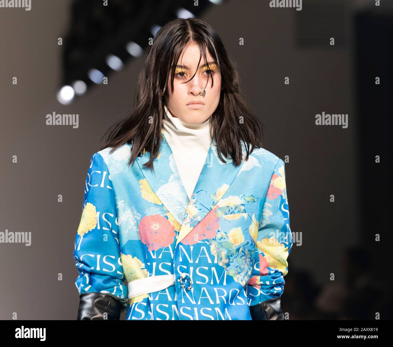 New York, NY - February 12, 2020: Model walks runway for Dirty Pineapple by Elsa Zai and Nellie Wang collection during Fashion Week at Spring Studios Stock Photo