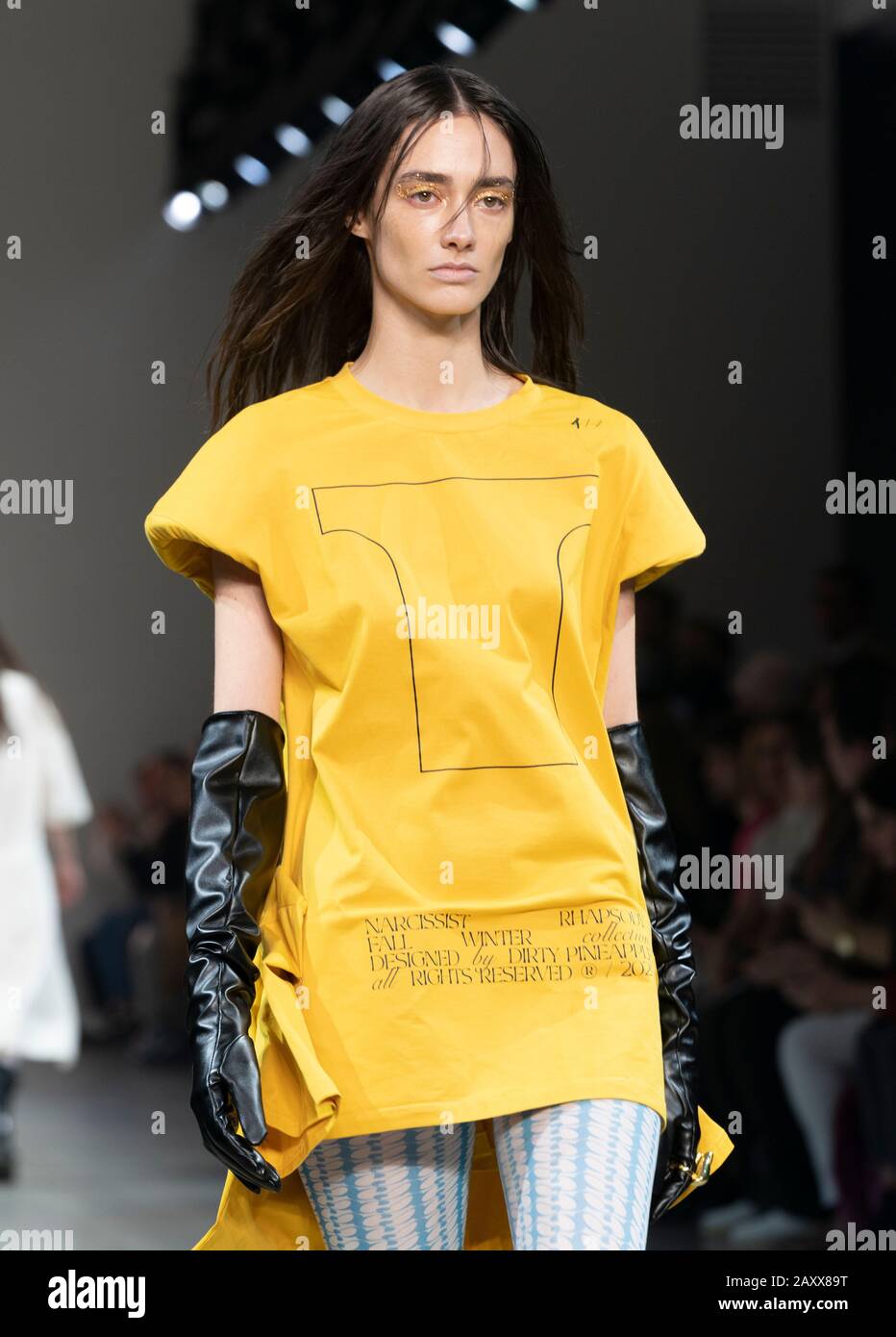 New York, NY - February 12, 2020: Model walks runway for Dirty Pineapple by Elsa Zai and Nellie Wang collection during Fashion Week at Spring Studios Stock Photo