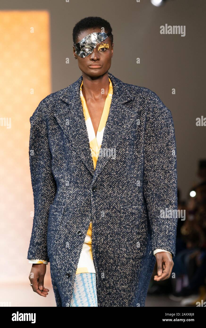 New York, NY - February 12, 2020: Model walks runway for Dirty Pineapple by Elsa Zai and Nellie Wang collection during Fashion Week at Spring Studios Stock Photo