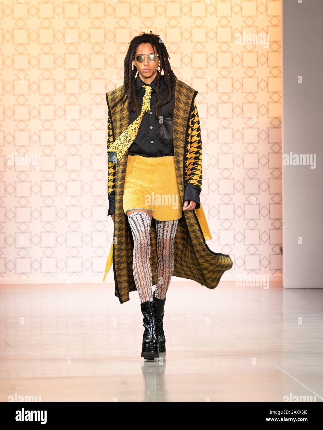 New York, NY - February 12, 2020: Model walks runway for Dirty Pineapple by Elsa Zai and Nellie Wang collection during Fashion Week at Spring Studios Stock Photo