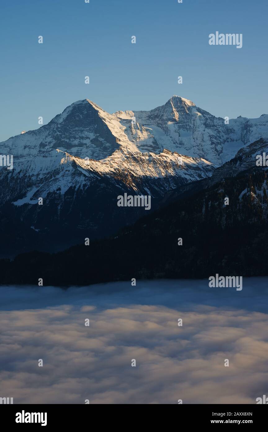 A view over Eiger, Monch and Jungfrau in Bernese Oberland, Switzerland. Stock Photo