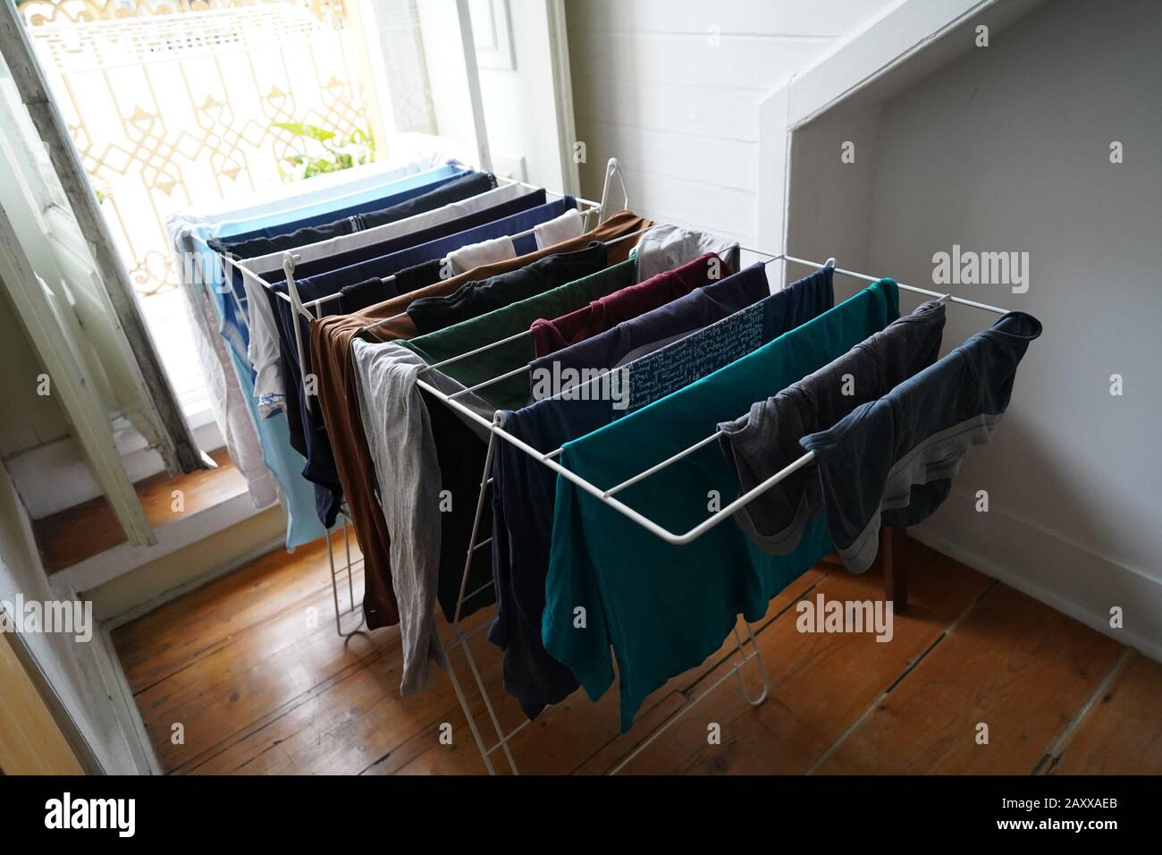 drying clothes by the balcony Stock Photo