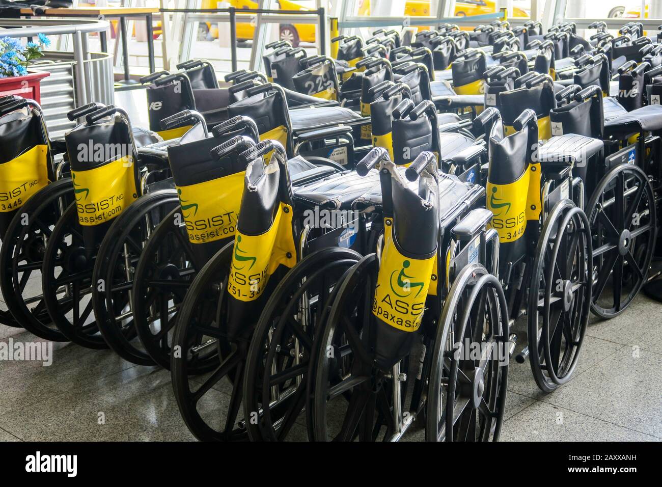 Wheelchairs available at JFK International Airport, NYC, USA Stock